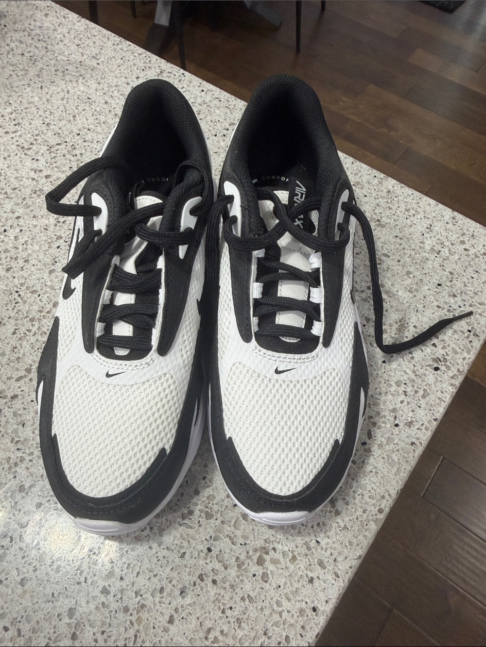 Nike women’s Black and White Mesh Sneaker
